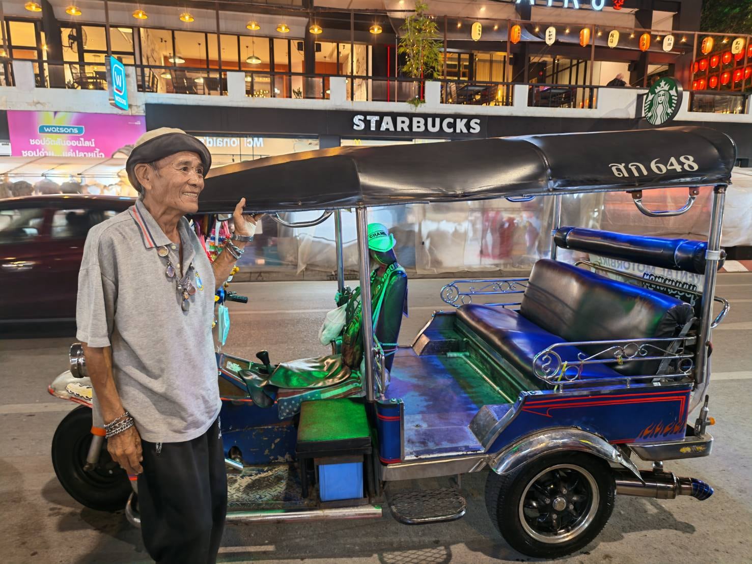 Street Food & Tuk-Tuk — your driver and tuk-tuk, lit up for a Chiang Mai night ride
